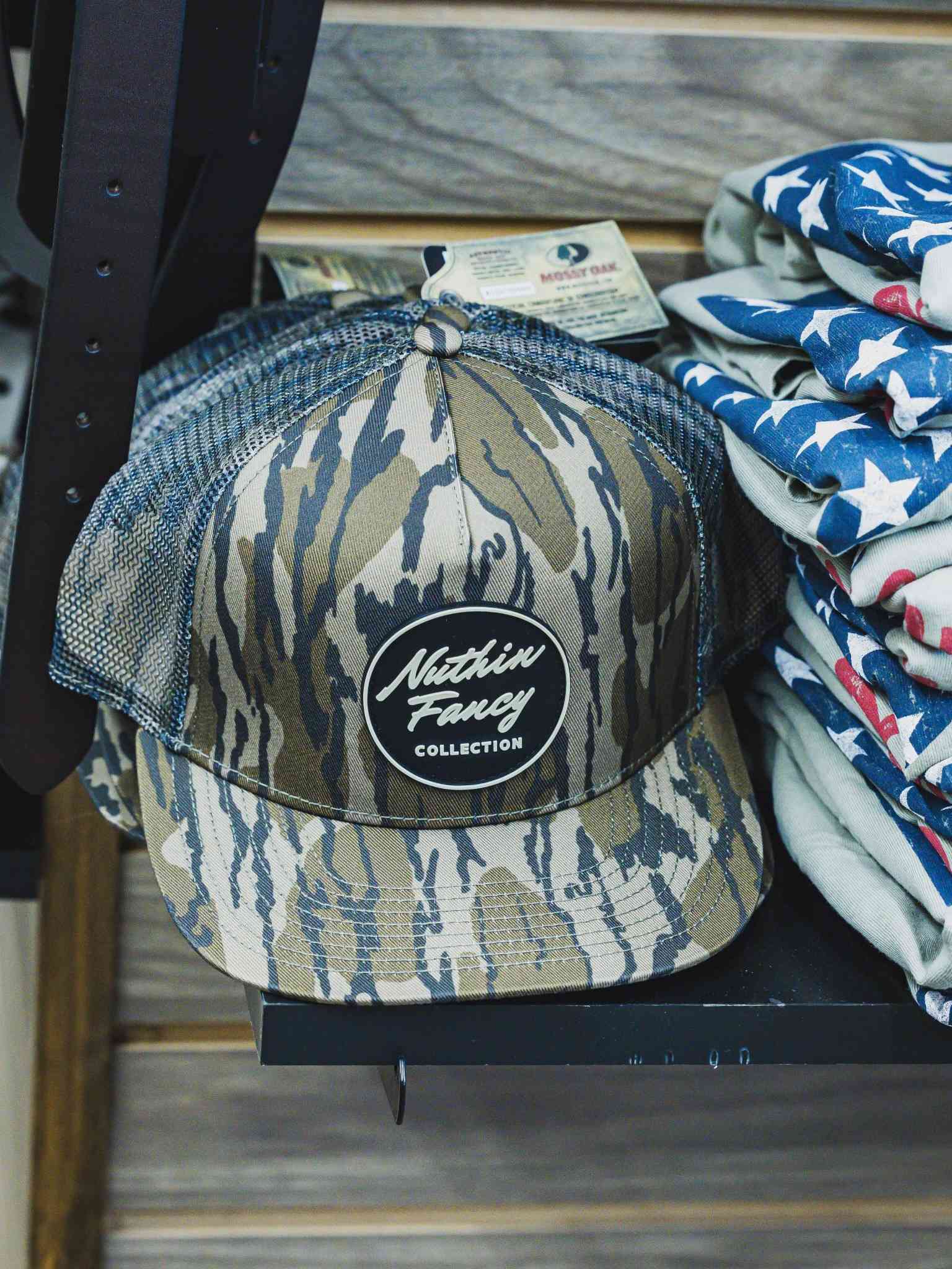 Nuthin Fancy Co camouflage trucker hat available at Reeves Clayton GA